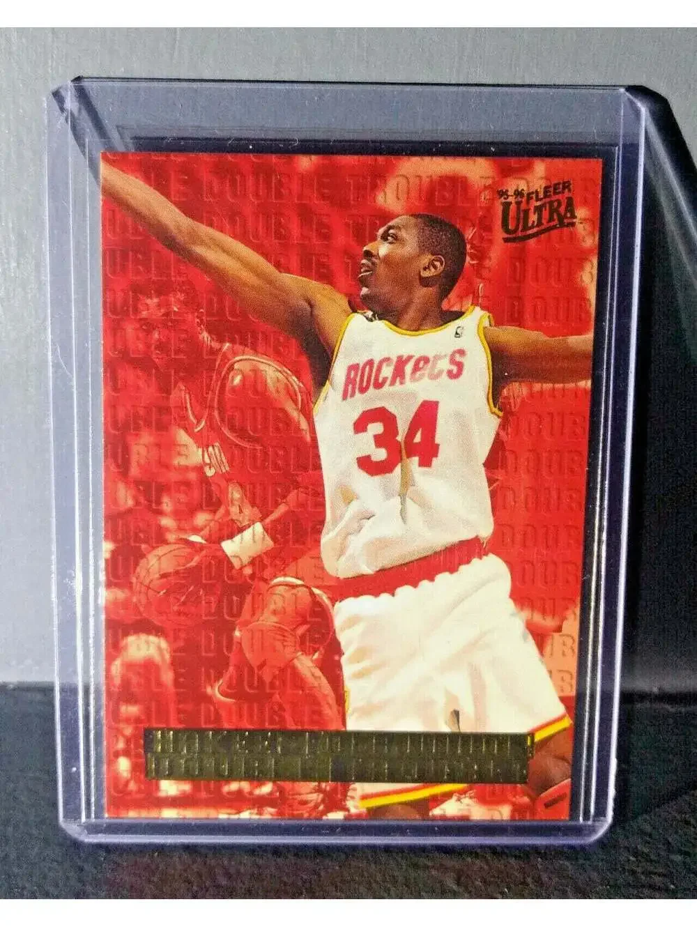 1995-96 Hakeem Olajuwon Fleer Ultra Double Trouble #5 Basketball Card
